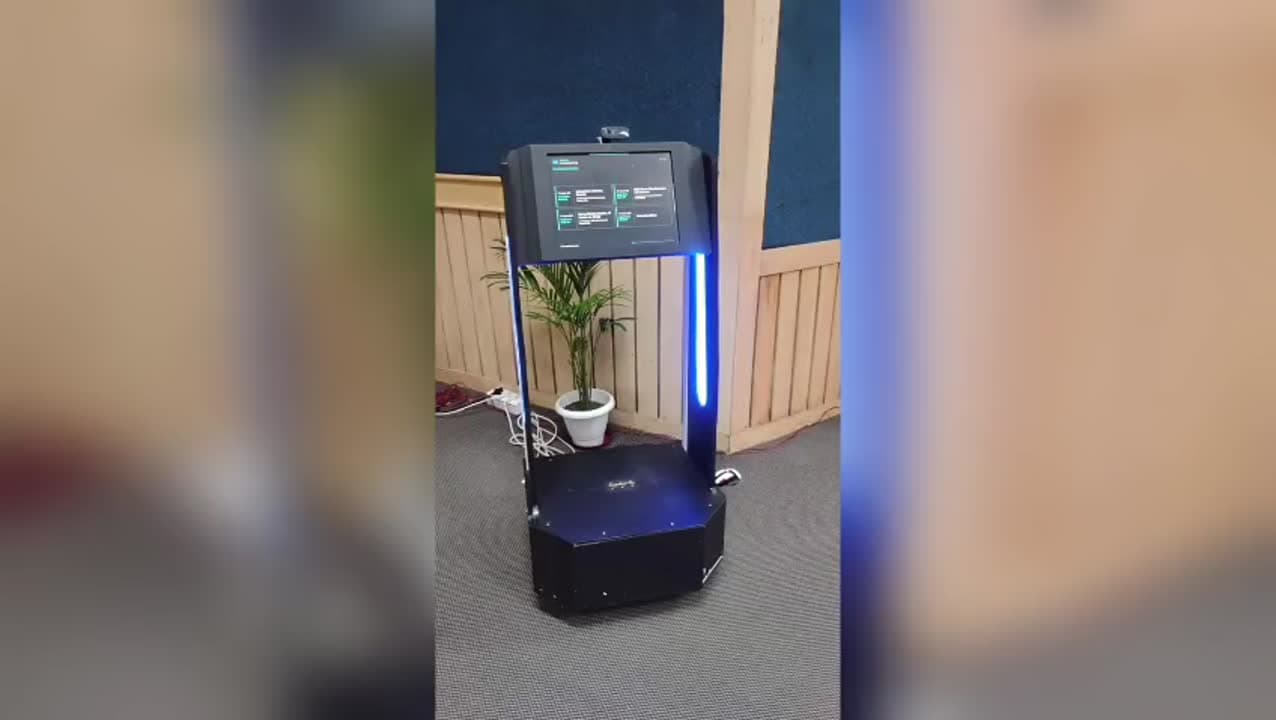 Original LinkedIn video preview showing the MIRA robotic kiosk